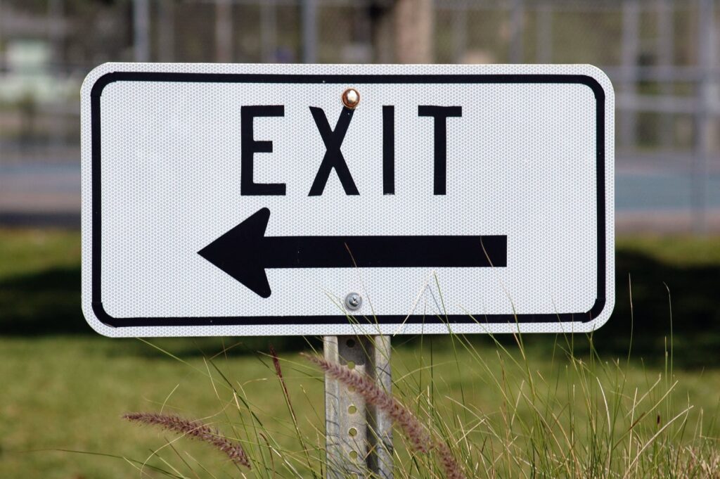 Exit road sign describes how we want to get out of life circumstances rather than go through them.