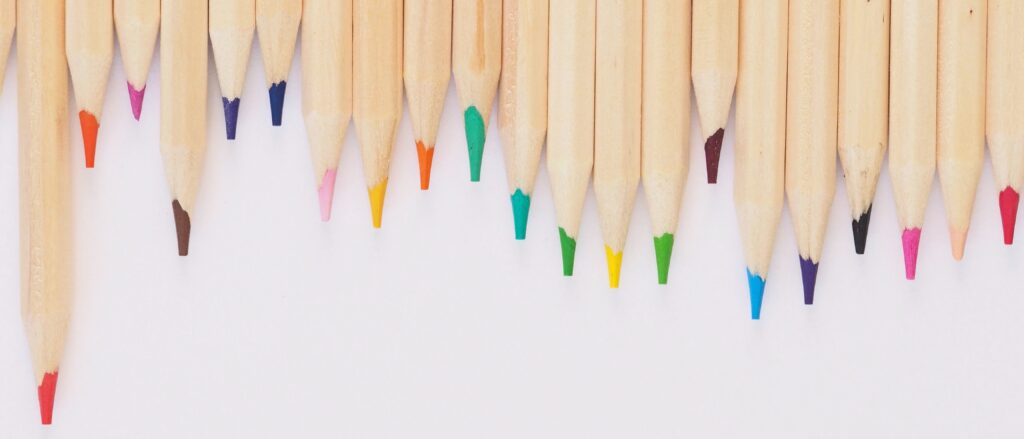 New, sharpened colored pencils in a variety of colors