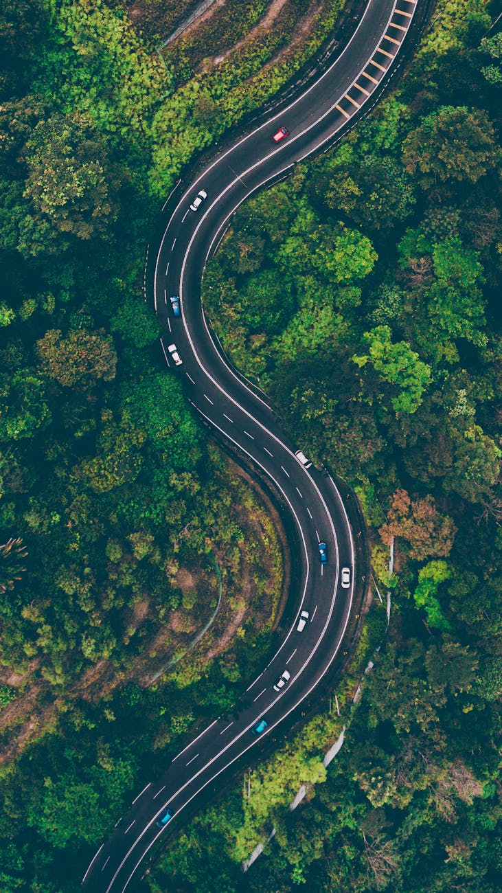 aerial view of road in with cars on cruise control